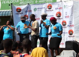 Members of the CHRP team perform a live show to address family planning, nutrition, gender-based violence, and HIV.