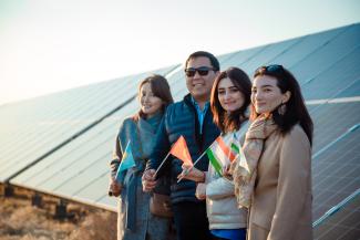 Manzura (second from the right) with other DKU students, and USAID PCA representatives at Kapchagay Solar Power Plant. 