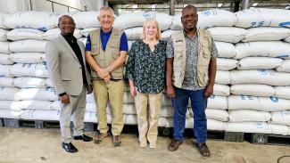 USAID Malawi Senior Technical Advisor Kumbukani Chirwa, Country Director and Representative for the World Food Programme, Mr. Paul Turnbull, USAID Mission Director Pamela Fessenden and Department Of Disaster Management Affairs (DoDMA)'s Deputy Director Responsible for disaster preparedness Fredson Chikuse pose for a photo after the announcement. Photo: Oris Chimenya/USAID