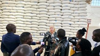 USAID Mission Director Pamela Fessenden is interviewed by the members of media outlets at the announcement media event. Photo: Oris Chimenya/USAID