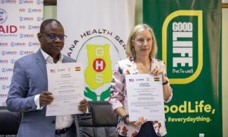 Director General of Ghana Health Service, Dr. Patrick Kuma-Aboagye (l) and USAID Ghana Mission Director Kimberly Rosen at the signing ceremony in Accra