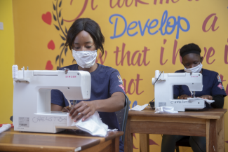 DREAMS Kozo Girls sew masks to support livelihoods and protect their communities