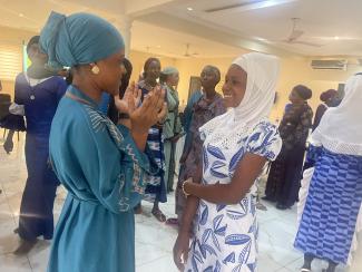 Participants socialize during Girls Caucus training in Bole