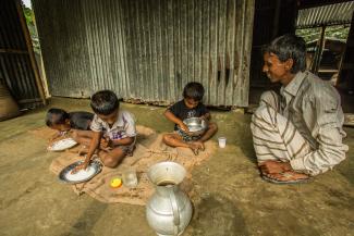 A family enjoying their meal.