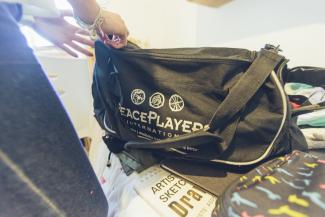 A PeacePlayers basketball bag.