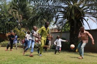 Survivors of trafficking in persons playing soccer at the accommodation center 