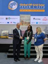 Power Africa Acting Coordinator. Ted Lawrence. with SureChill's Senior Partnership Manager, Diana Sasi, and Chief Commercial Officer, Ceri Jones, at the eighth Global Off-Grid Solar Forum and Expo in Nairobi, Kenya, where the grant winners were announced.