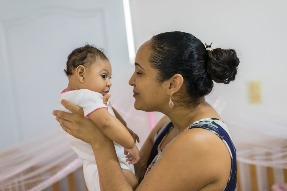 A woman holds her Zika afflicted newborn. Photo credit: USAID/Thomas Cristofoletti/Ruom